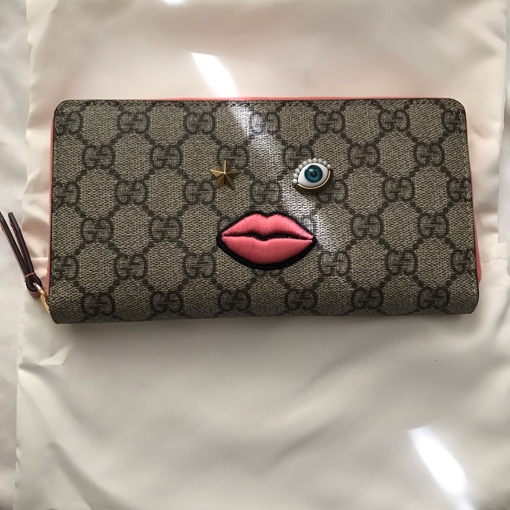 Gucci embroidered-face zip around wallet
